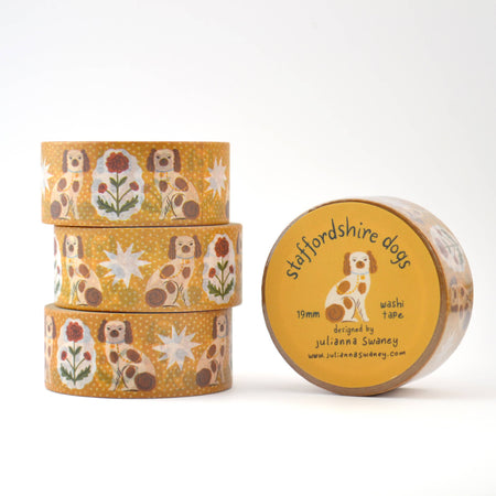 Set of washi tape rolls with Staffordshire dog design on a white background