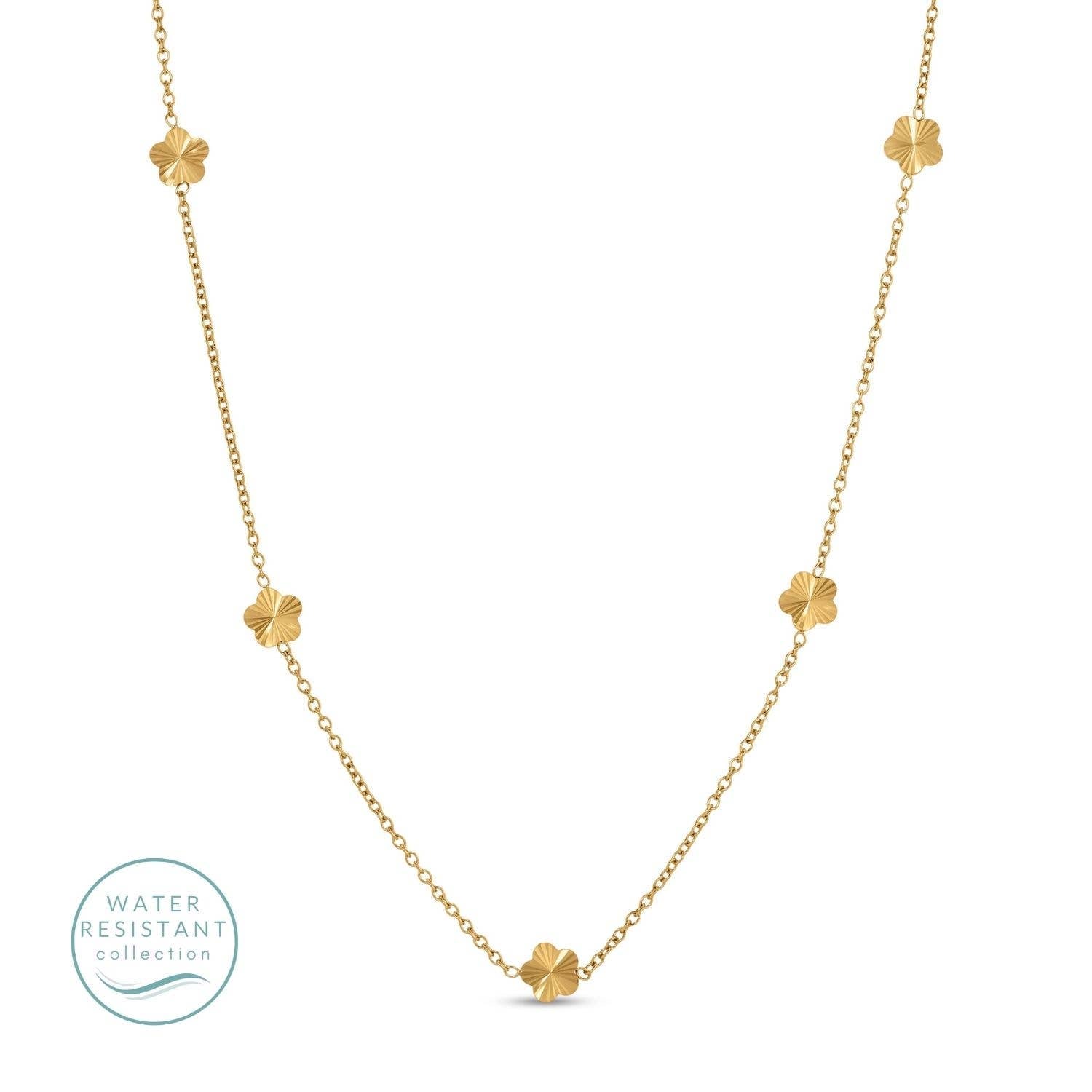 Gold necklace with floral pendants on a white background