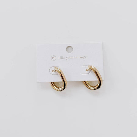 Gold hoop earrings on a white card with 'like your earrings' text on a light gray background