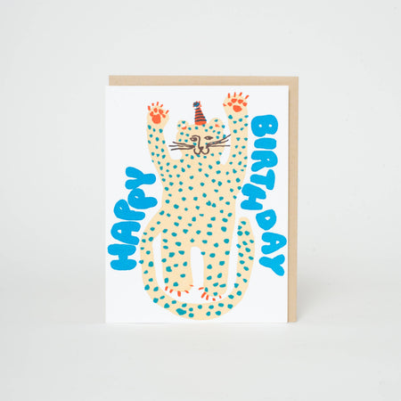 Birthday card with a cat illustration and 'Happy Birthday' text on a white background