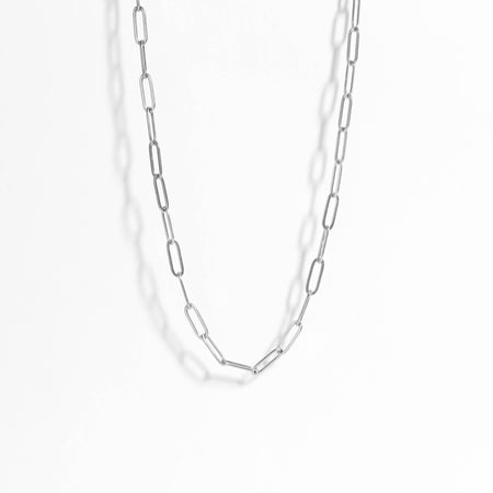 Silver chain necklace on a white background