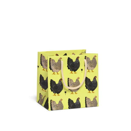Gift bag with chicken pattern on a white background