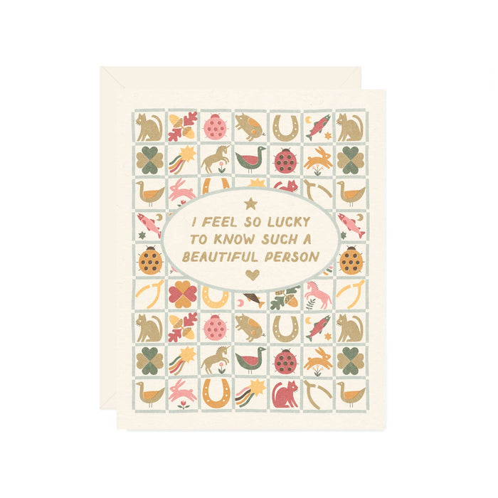 Greeting card with decorative symbols and a message on a white background
