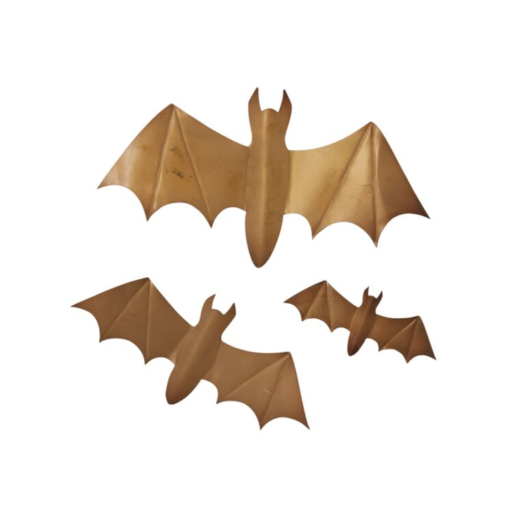 A set of three different sized winged bats in brown color designed for wall decoration.