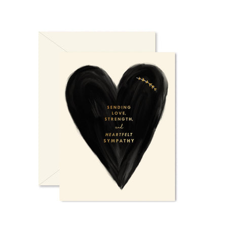 Greeting card with black heart and text on a white background