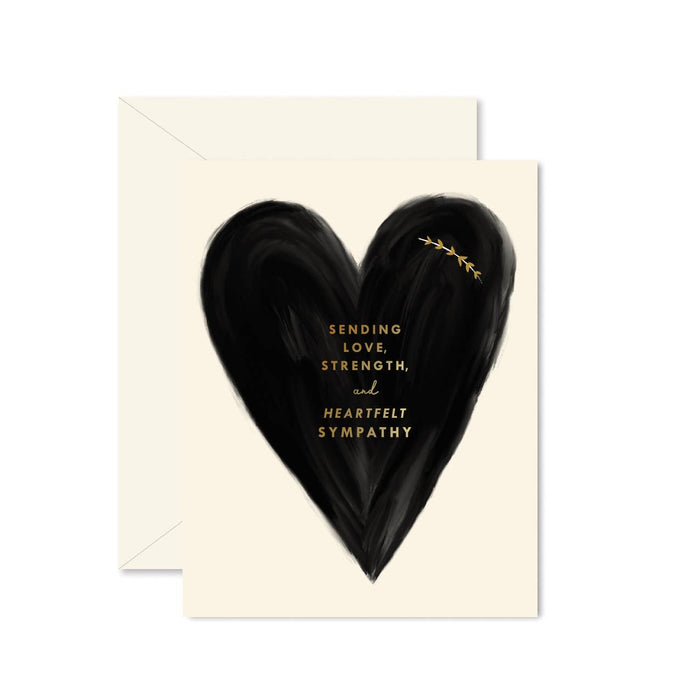 Greeting card with black heart and text on a white background