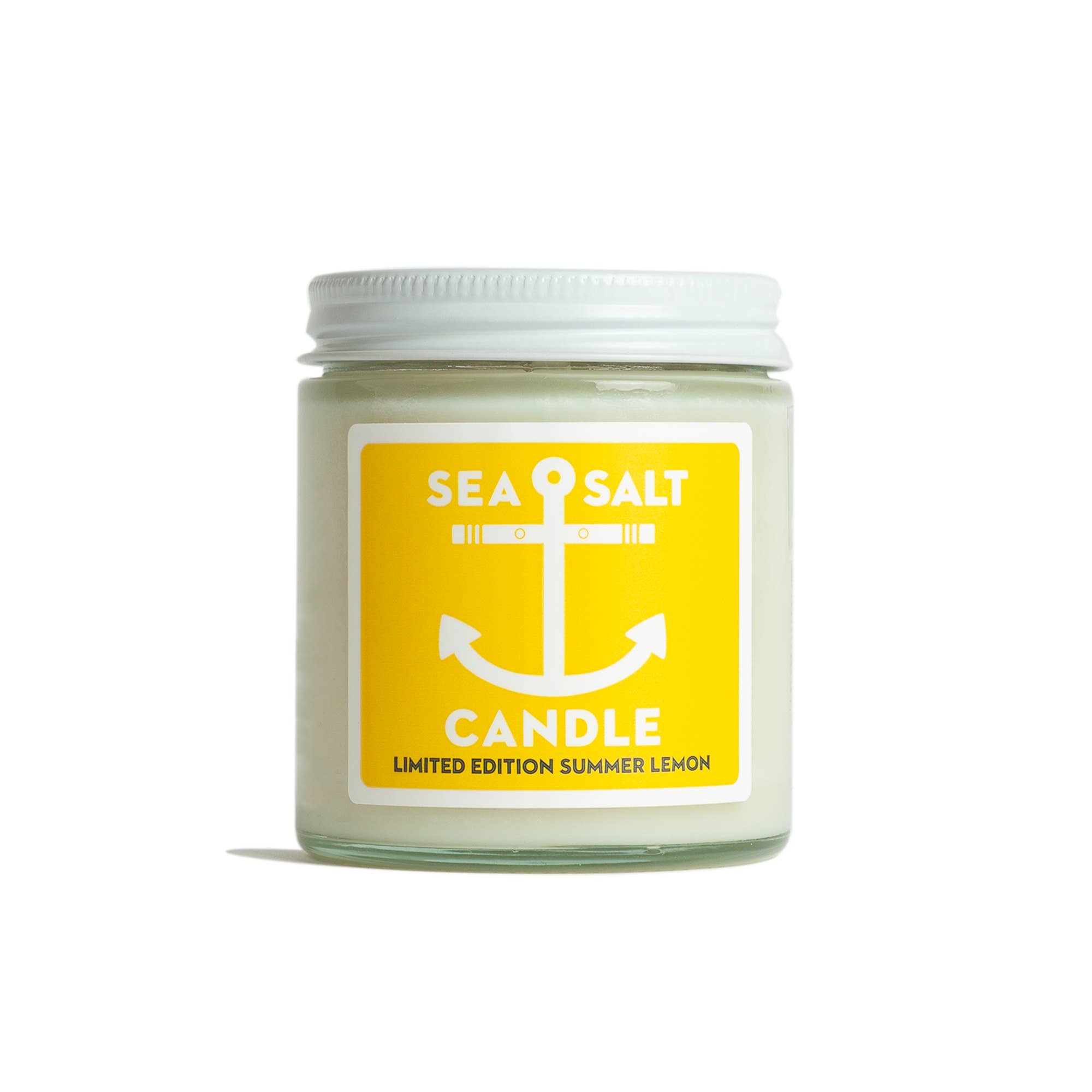 Sea salt candle with a yellow label on a white background