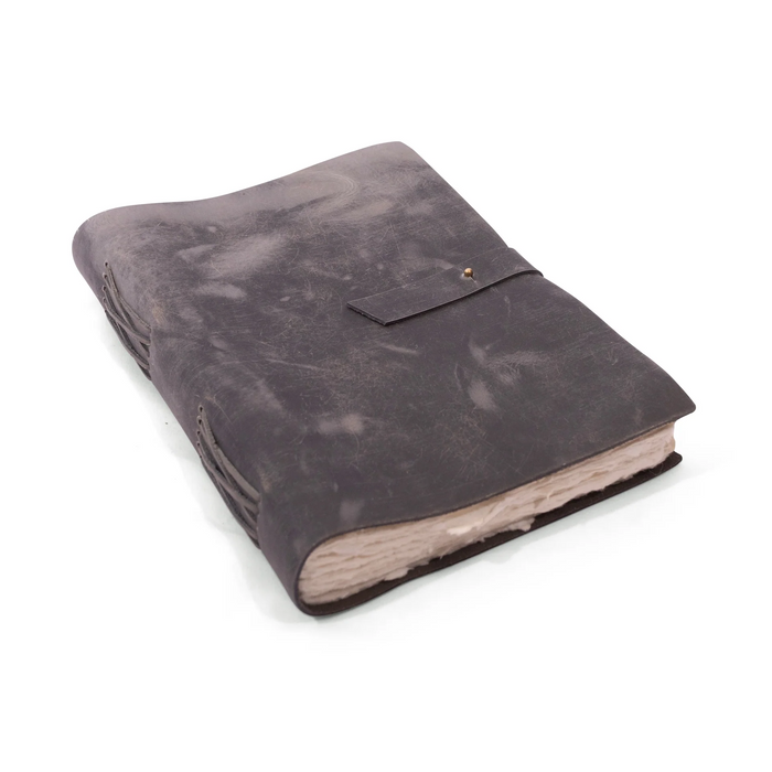 Brown leather notebook with a pocket on a white background