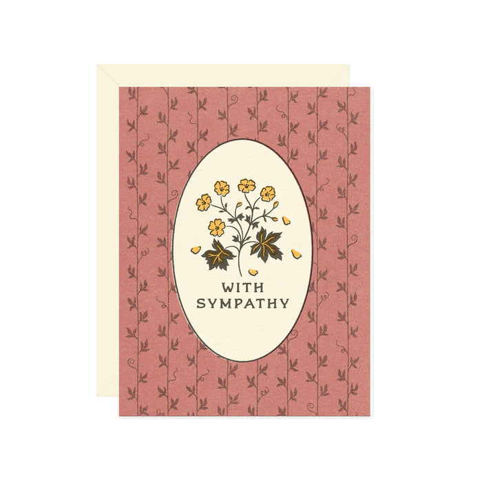 Sympathy card with floral design and 'With Sympathy' text on a red background