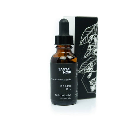 Santal Noir beard oil bottle with dropper and black packaging on a white background