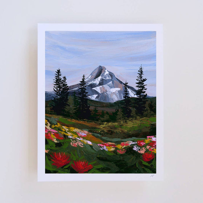 Painting of a mountain landscape with flowers and trees on a white wall.