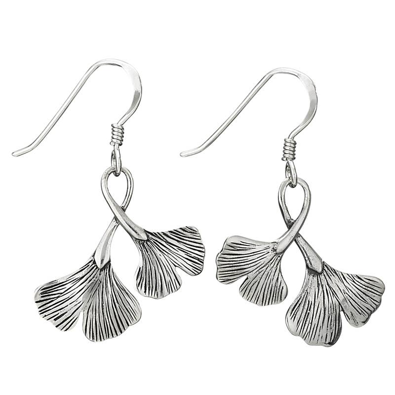 Silver leaf-shaped earrings on a white background
