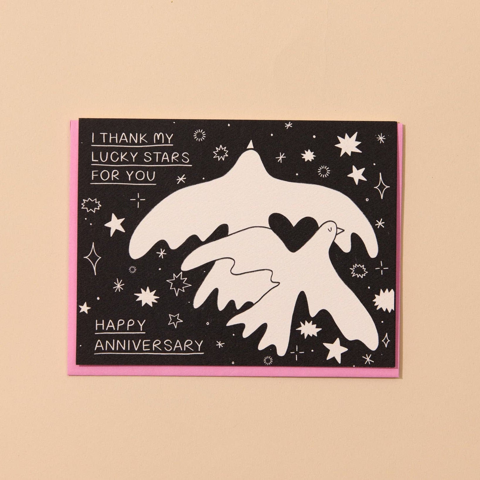 Greeting card with star design and text on a beige background