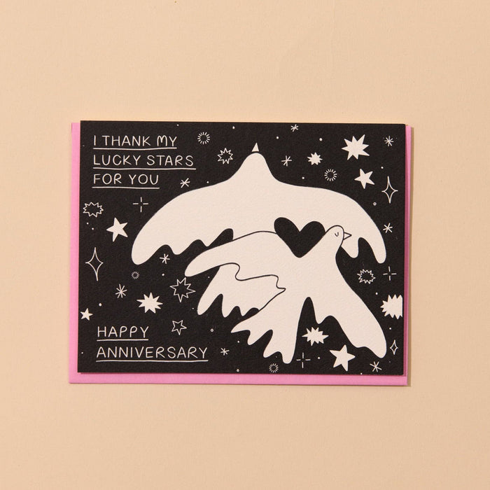 Greeting card with star design and text on a beige background