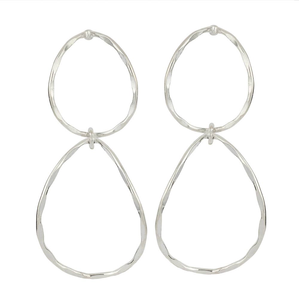 Pair of silver hoop earrings on a white background