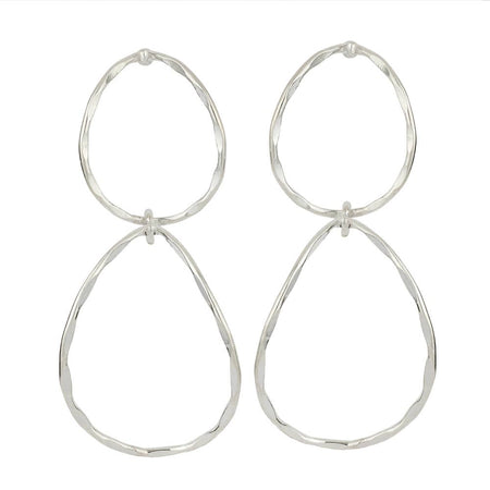 Pair of silver hoop earrings on a white background