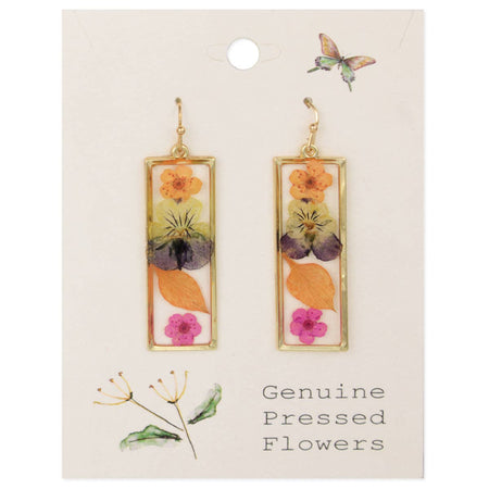 Pair of earrings with pressed flowers on a card labeled 'Genuine Pressed Flowers'.
