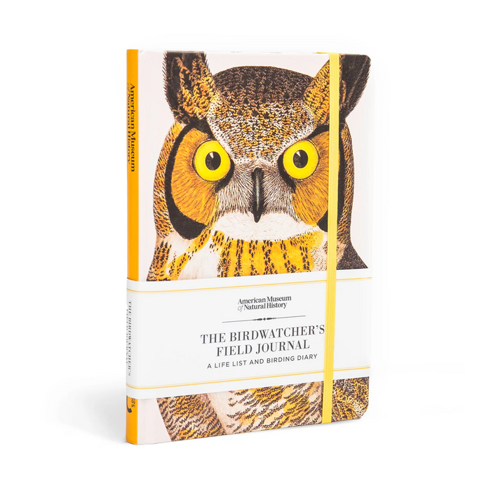 Birdwatcher's field journal, a book featuring a yellow, brown, and white owl on the cover.