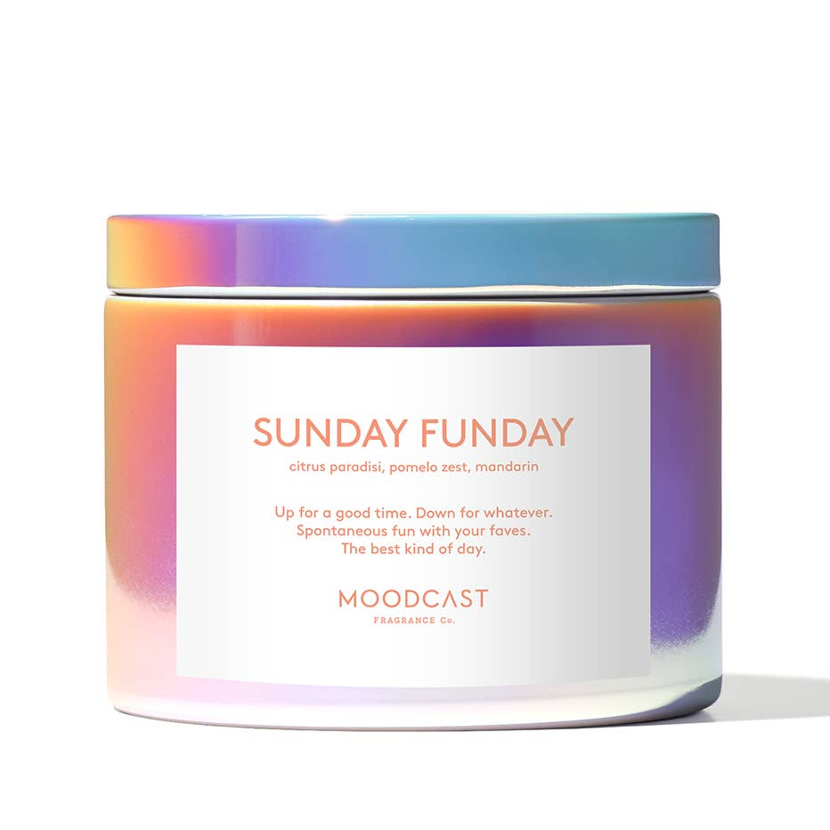 Candle jar with 'Sunday Funday' text and colorful gradient lid on a white background