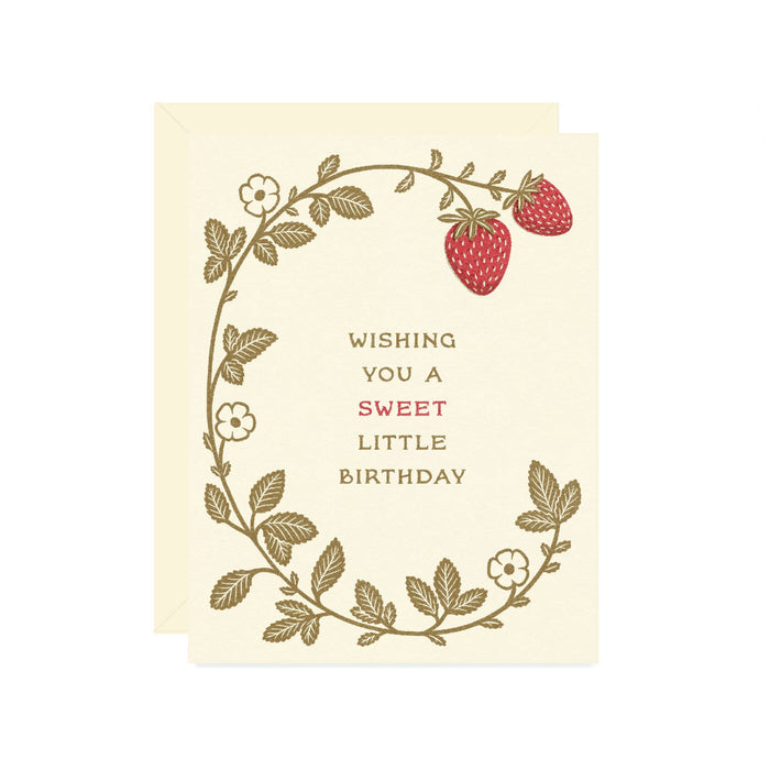 Greeting card with strawberry design and text 'Wishing you a sweet little birthday' on a white background