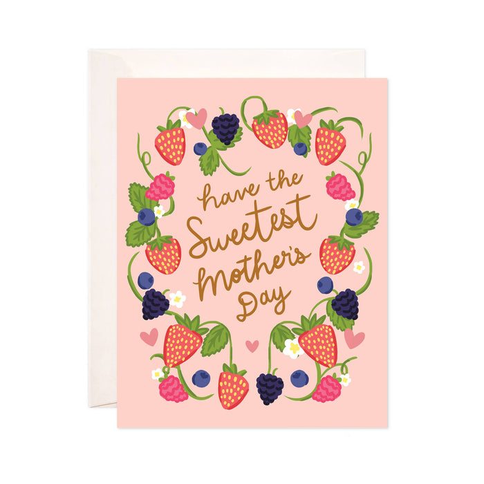 Greeting card with strawberry and berry design and 'have the sweetest Mother's Day' text on a pink background.