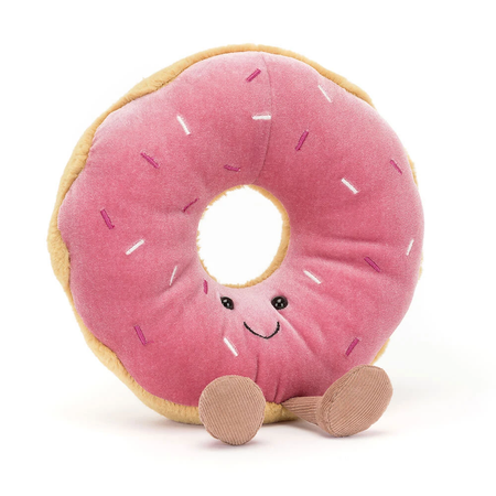 pink donut shaped jellycat stuffie with face and legs