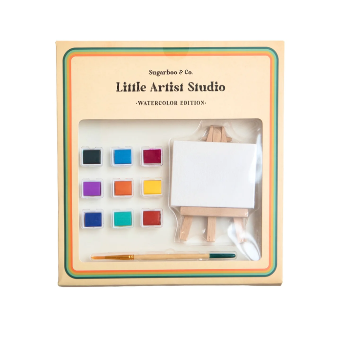 Children's art set with watercolor paints, an easel, and a brush in a 'Little Artist Studio' packaging.