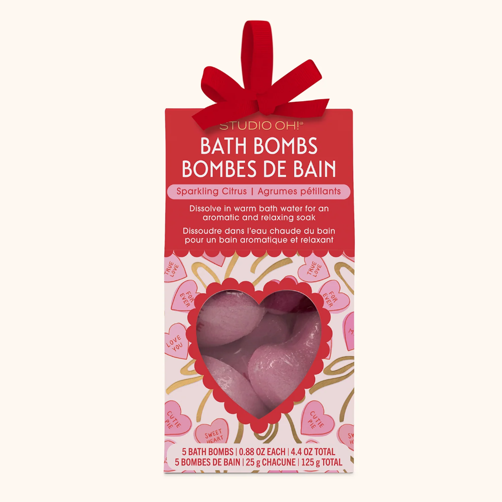 Packaging of bath bombs with a heart-shaped pink bath bomb on a white background