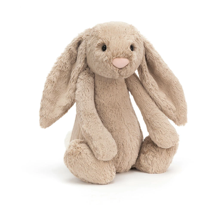 Plush bunny toy on a white background