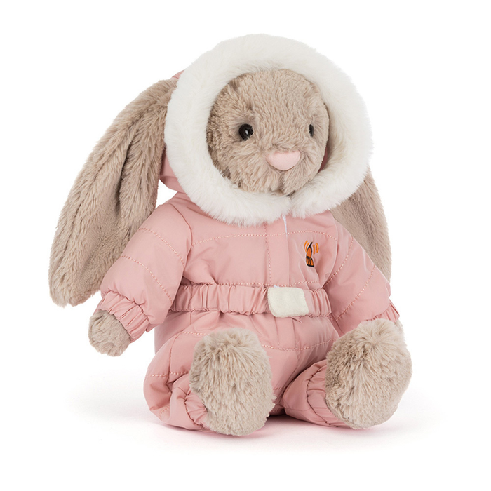 Plush toy rabbit in a pink snowsuit with white fur trim on a white background
