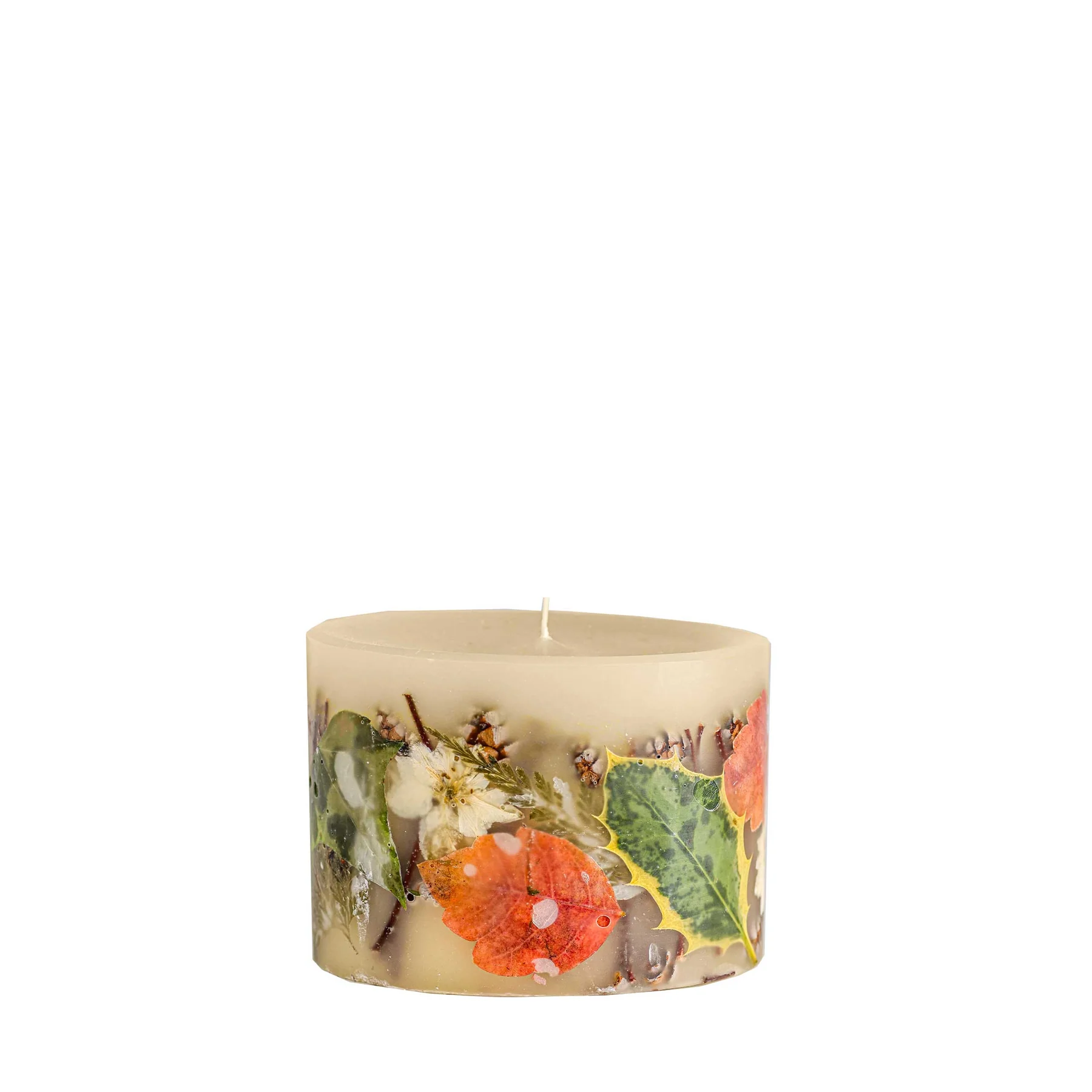 pillar candle with leaves pressed in