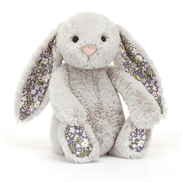 Plush bunny toy with floral ears and feet on a white background