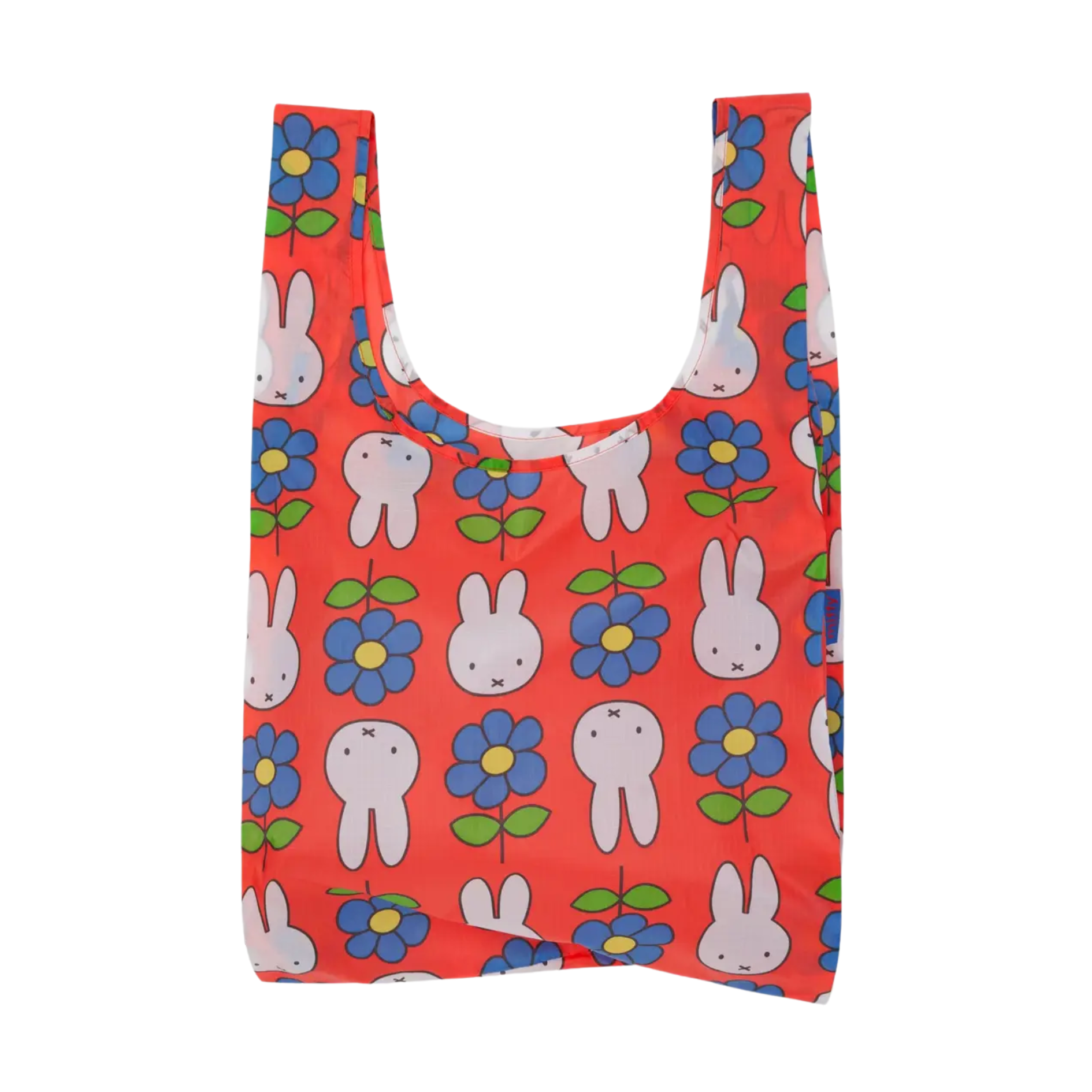 A red reusable shopping bag with a pattern of miffy, blue and green flowers on a white background.