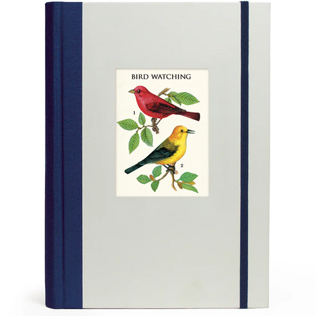 Notebook with bird illustration on the cover against a white background