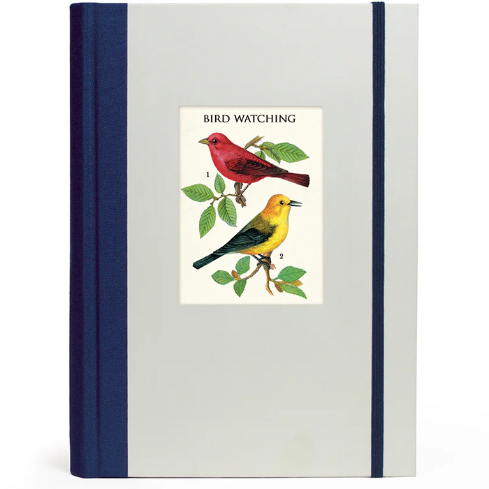 Notebook with bird illustration on the cover against a white background
