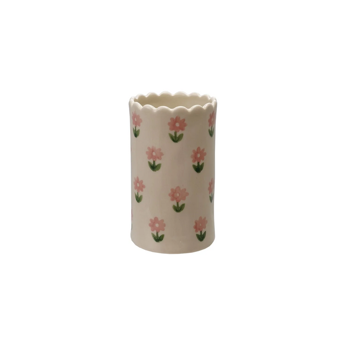 Small white vase with pink floral pattern and scalloped edge