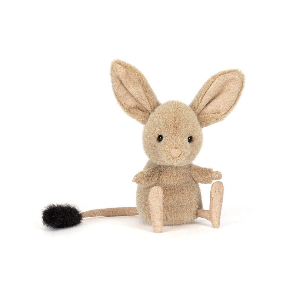 Plush toy Jerboa with a black tail on a white background