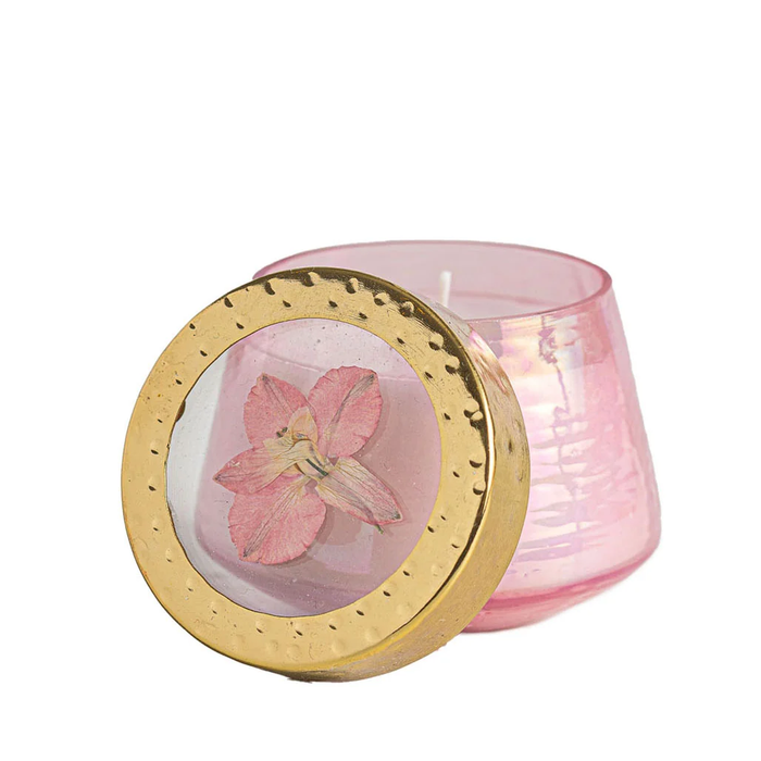 pink candle with pressed flower lid