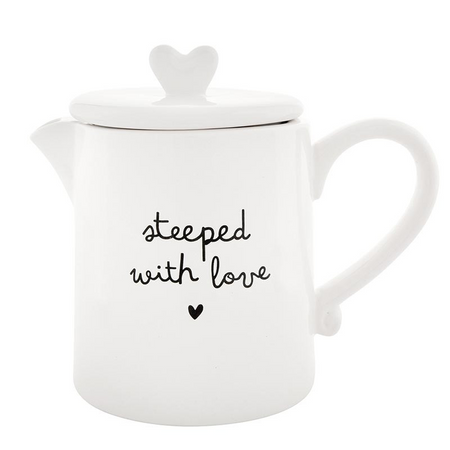 White teapot with 'steeped with love' text on a white background