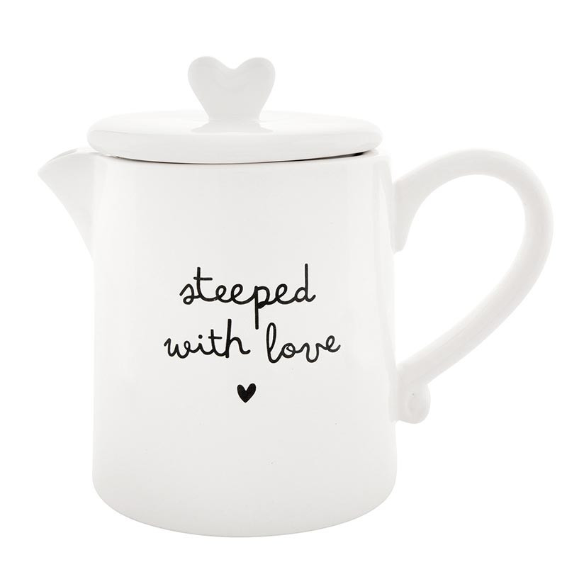 White teapot with 'steeped with love' text on a white background