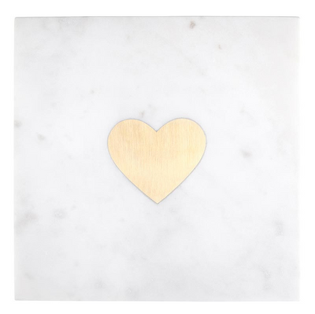 white marble board with a gold heart in the center