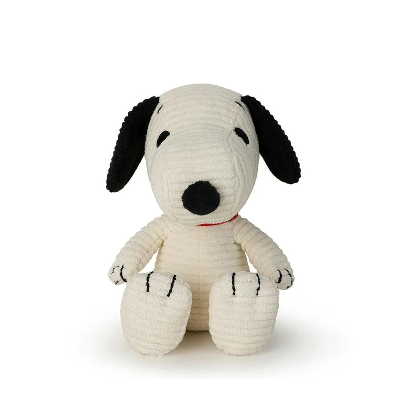Cream corduroy Snoopy plush sitting upright with black floppy ears, a black nose, and a red collar.