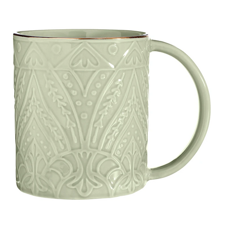 A light sage green ceramic mug with an embossed geometric and floral pattern, featuring a thin copper-gold rim and a matching handle, shown on a white background.
