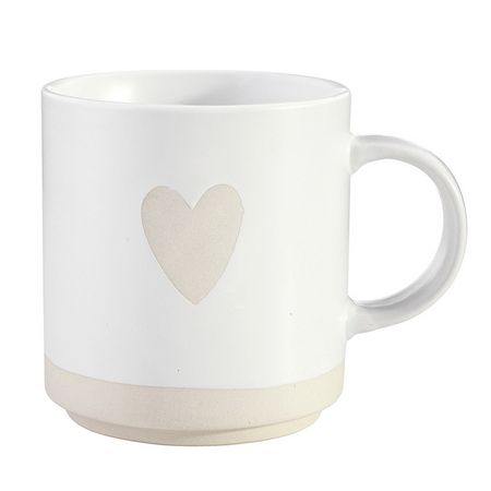 White mug with a beige heart design on a white background