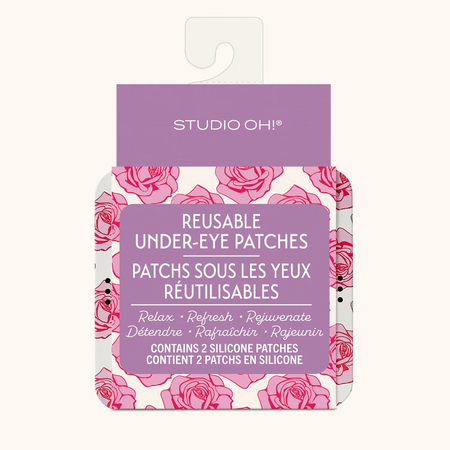 Pack of reusable under-eye patches with pink floral design and purple label on a white background