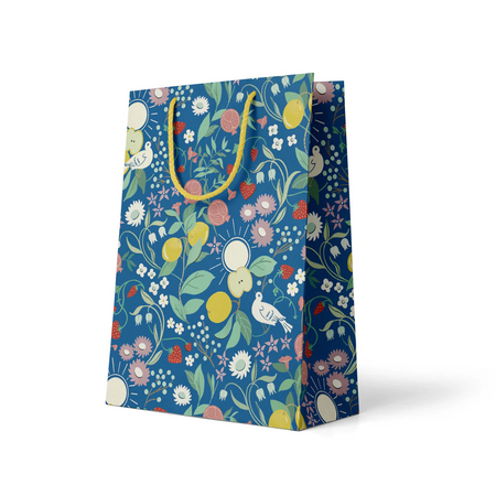 navy blue and floral gift bag with yellow handle