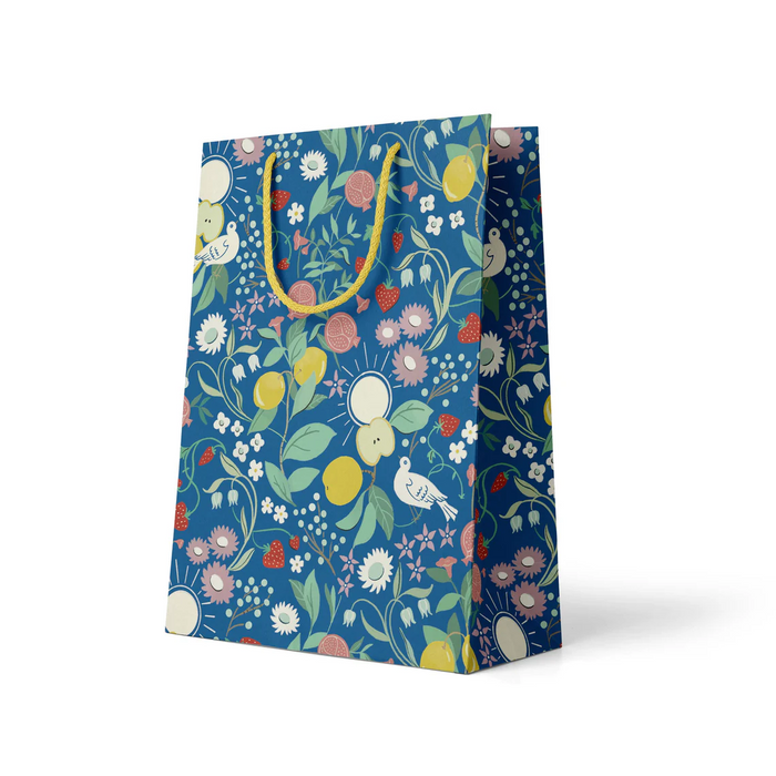 navy blue and floral gift bag with yellow handle