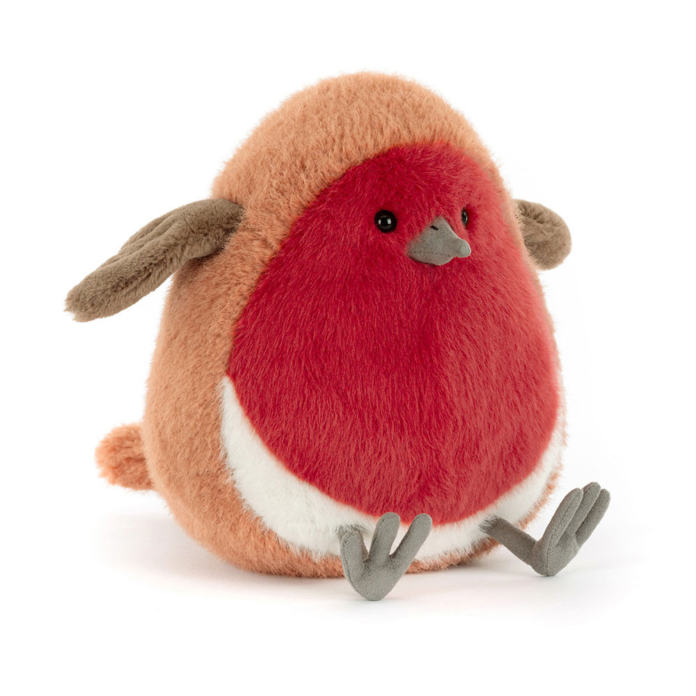 Plush toy resembling a red robin on a white background