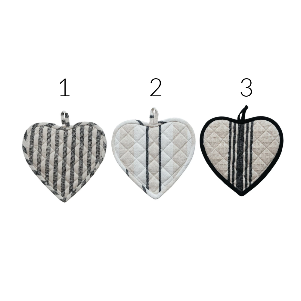 black and white heart pot holders on white bakground