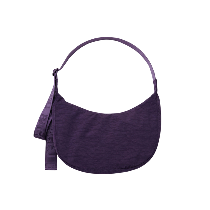 Purple shoulder bag on a white background